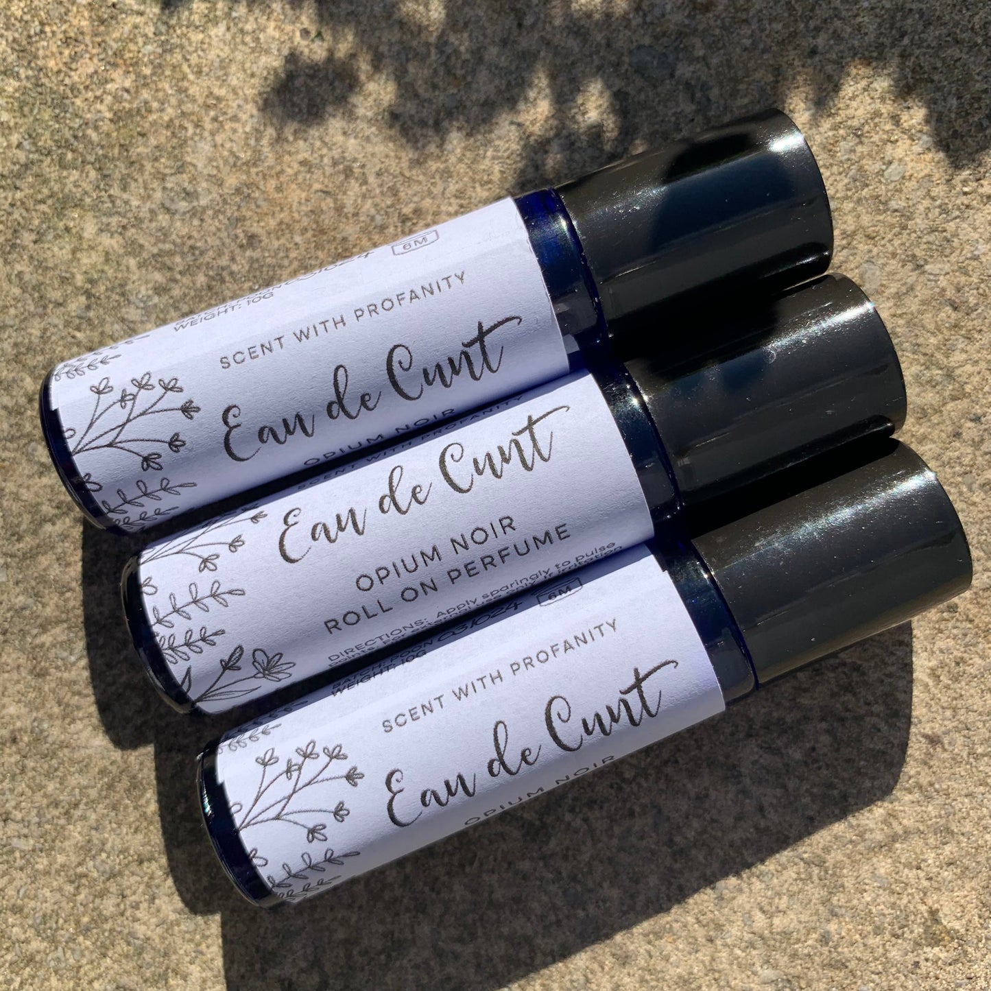 Opium Noir Roll on Perfume